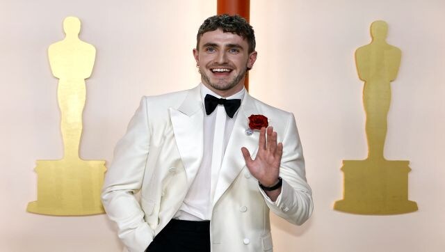 Irish star Paul Mescal went for a 1970s vibe with his white Gucci tuxedo and flared trousers. Reuters Irish star Paul Mescal went for a 1970s vibe with his white Gucci tuxedo and flared trousers. Reuters