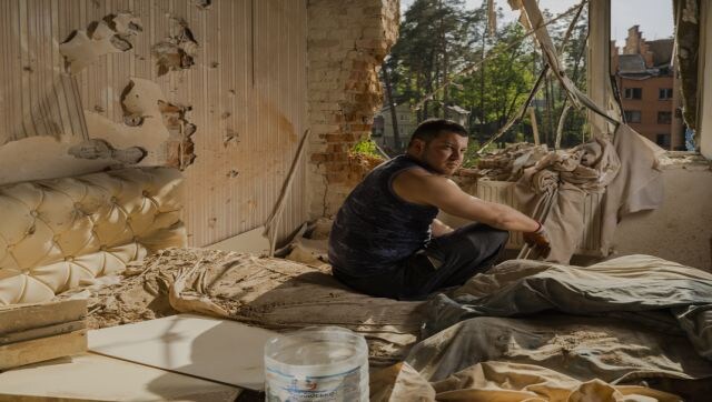 Volodymyr Husak, Irpin: Volodymyr Husak (28) at one of the apartments in the Dub-ok co-op building in Irpin, Ukraine. The Russian invasion of Ukraine has become a particularly brutal affair because of the heavy civilian losses and the destruction of civilian infrastructure. Tragically, as the war continues, people living in Ukraine are getting used to it. Image Courtesy: Sasha Maslov/Sony World Photography Awards 2023 Volodymyr Husak, Irpin: Volodymyr Husak (28) at one of the apartments in the Dub-ok co-op building in Irpin, Ukraine. The Russian invasion of Ukraine has become a particularly brutal affair because of the heavy civilian losses and the destruction of civilian infrastructure. Tragically, as the war continues, people living in Ukraine are getting used to it. Image Courtesy: Sasha Maslov/Sony World Photography Awards 2023