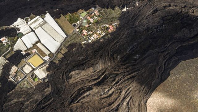 An aerial view of the lava flows from the volcano. This volcanic eruption on the island of La Palma in the Canary Islands started on 19 September 2021 and lasted for 85 days, destroying thousands of homes and displacing more than 10,000 people in the process. It also covered large areas with ash, which now accumulates everywhere. Image Courtesy: Cesar Dezfuli/Sony World Photography Awards 2023 An aerial view of the lava flows from the volcano. This volcanic eruption on the island of La Palma in the Canary Islands started on 19 September 2021 and lasted for 85 days, destroying thousands of homes and displacing more than 10,000 people in the process. It also covered large areas with ash, which now accumulates everywhere. Image Courtesy: Cesar Dezfuli/Sony World Photography Awards 2023