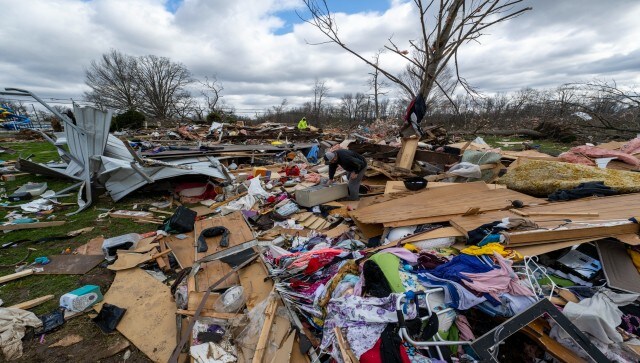 Chainsaws buzzed, as bulldozers ploughed into debris. Utility crews restored to power as some neighbourhoods began recovery. AP