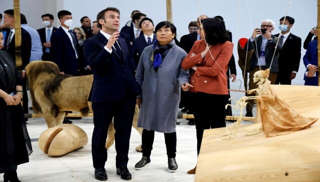 The president was accompanied by French culture minister Rima Abdul Malak and Chinese artists in Beijing. AP