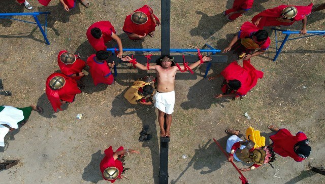 In San Juan village, north of Manila, hundreds of residents and tourists watched a blood-soaked re-enactment of Jesus Christ’s last moments. Organisers said more than 15,000 foreign and Filipino tourists and devotees gathered for the cross nailings in Cutud and two other nearby villages. AP In San Juan village, north of Manila, hundreds of residents and tourists watched a blood-soaked re-enactment of Jesus Christ’s last moments. Organisers said more than 15,000 foreign and Filipino tourists and devotees gathered for the cross nailings in Cutud and two other nearby villages. AP