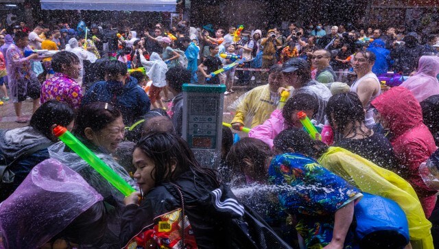 Volunteers from the authority assisted a Thai service team on Sunday morning with setting up venues and moving supplies for the Songkran event in Kowloon City. AP