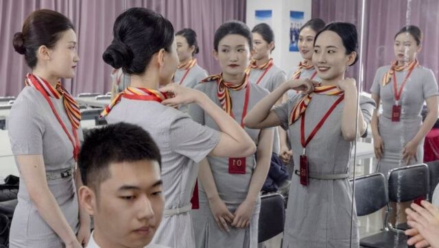 Youths in China rush to become flight attendants as travel rebounds after three years Youths in China rush to become flight attendants as travel rebounds after three years
