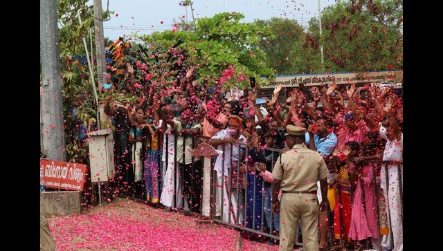 The PM briefly stood on the footboard of his vehicle, surrounded by SPG personnel, to wave at the public as well as party workers and supporters on the roadside who cheered him on with drum beats and chants of ‘Modi’. Image Courtesy: @narendramodi/Twitter The PM briefly stood on the footboard of his vehicle, surrounded by SPG personnel, to wave at the public as well as party workers and supporters on the roadside who cheered him on with drum beats and chants of ‘Modi’. Image Courtesy: @narendramodi/Twitter