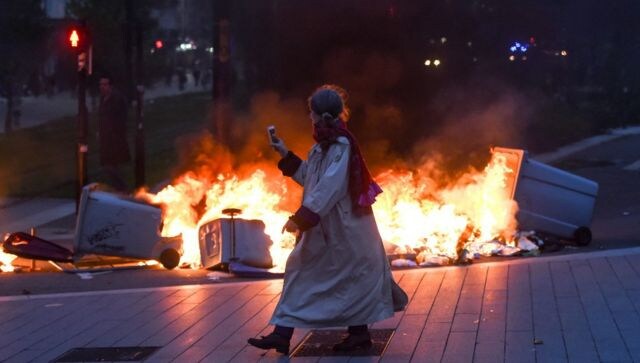Protests in some parts of France turned violent on Friday (14 April) after the country’s top court gave its nod to key elements of widely unpopular pension reforms. Earlier today, French president Emmanuel Macron signed the controversial plan into law. AFP Protests in some parts of France turned violent on Friday (14 April) after the country’s top court gave its nod to key elements of widely unpopular pension reforms. Earlier today, French president Emmanuel Macron signed the controversial plan into law. AFP