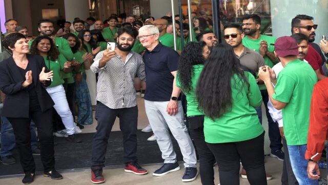 Apple’s Tim Cook poses with a fan outside the BKC Apple store. Apple launched its online store in India in 2020, but had not opened an official physical shop until now due to previous investment rules, since relaxed, requiring foreign retailers to source 30 percent of raw materials locally, and pandemic delays. Reuters