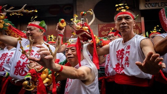 Performers make a dragon pose before the start of the Drunken Dragon celebration which is believed to bring prosperity and safety to the fishing community in Macao. The Macao tale of a Buddhist monk and a celestial dragon rescuing people from the disease during the Qing Dynasty (1644–1911) is also believed to be source of the Drunken Dragon Festival. AFP Performers make a dragon pose before the start of the Drunken Dragon celebration which is believed to bring prosperity and safety to the fishing community in Macao. The Macao tale of a Buddhist monk and a celestial dragon rescuing people from the disease during the Qing Dynasty (1644–1911) is also believed to be source of the Drunken Dragon Festival. AFP