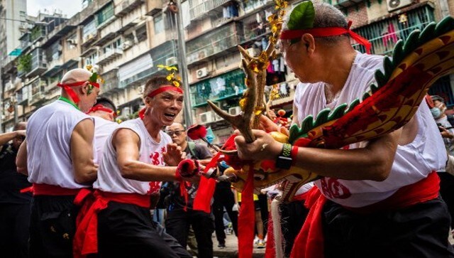 Performers dance during the Drunken Dragon celebration. The well-known drunken dragon dance from China’s Macao took place on 26 May as part of the Buddha’s Birthday celebrations for the first time in three years. The well-known dance is listed as part of the nation’s intangible cultural heritage. AFP Performers dance during the Drunken Dragon celebration. The well-known drunken dragon dance from China’s Macao took place on 26 May as part of the Buddha’s Birthday celebrations for the first time in three years. The well-known dance is listed as part of the nation’s intangible cultural heritage. AFP