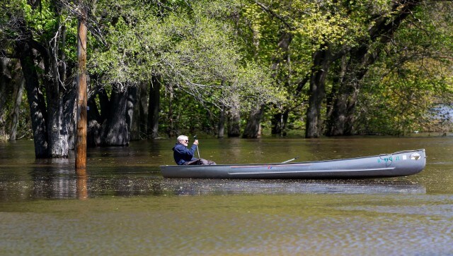 A citizen paddles his canoe down Island Avenue as the Mississippi River covers the street and blocks access to dozens of homes. In recent days the Mississippi flooded low-lying parks and trails in La Crosse, Wisconsin, and flooded streets and basements in the town of Campbell on French Island, which lies in the Mississippi and Black rivers just west of La Crosse. AP A citizen paddles his canoe down Island Avenue as the Mississippi River covers the street and blocks access to dozens of homes. In recent days the Mississippi flooded low-lying parks and trails in La Crosse, Wisconsin, and flooded streets and basements in the town of Campbell on French Island, which lies in the Mississippi and Black rivers just west of La Crosse. AP
