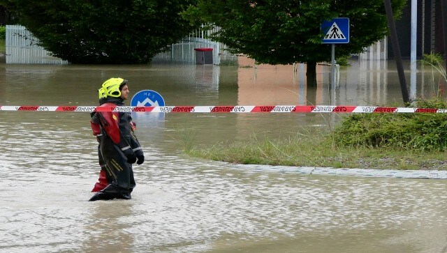 Some rescues were especially dramatic. In Cesena, neighbours swam across the fast-moving waters of a flooded street to take a young girl from her mother’s arms. One rescuer held the child above the floodwaters until she could be passed into the arms of other rescuers. Other residents helped the mother also to safety. AP Some rescues were especially dramatic. In Cesena, neighbours swam across the fast-moving waters of a flooded street to take a young girl from her mother’s arms. One rescuer held the child above the floodwaters until she could be passed into the arms of other rescuers. Other residents helped the mother also to safety. AP