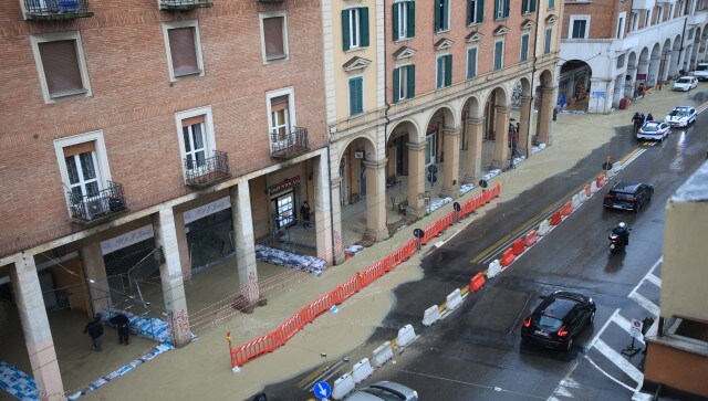 Sandbags are lined up along a flooded street in Bologna, Italy. The nearly 100,000 residents of the town were told to avoid the temptation to view the raging waters and not to stay on the ground floors if they lived near the river. AP Sandbags are lined up along a flooded street in Bologna, Italy. The nearly 100,000 residents of the town were told to avoid the temptation to view the raging waters and not to stay on the ground floors if they lived near the river. AP