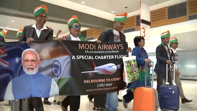 Indian expats wearing traditional turbans walk through Sydney Airport, carrying the Modi Airways banner, in Sydney. “The Indian Australian community is excited to welcome Prime Minister Narendra Modi after nine years. He visited Australia in 2014 and was greeted by a large crowd at Sydney’s community reception,” Jay Shah, one of IADF’s directors, told the Special Broadcasting Service, an Australian hybrid-funded public service broadcaster. AP Indian expats wearing traditional turbans walk through Sydney Airport, carrying the Modi Airways banner, in Sydney. “The Indian Australian community is excited to welcome Prime Minister Narendra Modi after nine years. He visited Australia in 2014 and was greeted by a large crowd at Sydney’s community reception,” Jay Shah, one of IADF’s directors, told the Special Broadcasting Service, an Australian hybrid-funded public service broadcaster. AP