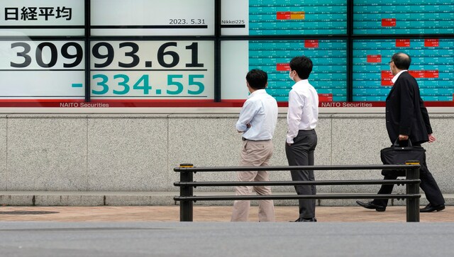 Shares fall as US debt deal goes to a vote; China data rattles nerves