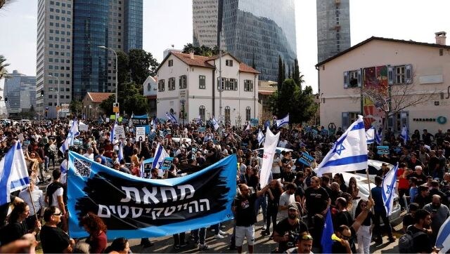 Number of Israeli cities strike in protest over tax plan as budget deadline looms