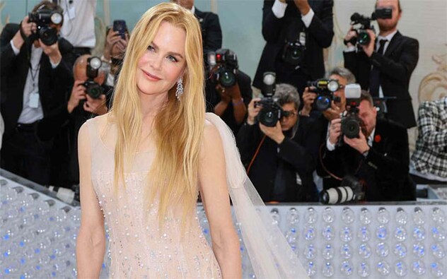 Nicole Kidman said it was Lagerfeld who ignited her fashion spark. She wore a pale pink gown created by Lagerfeld for a Chanel No. 5 commercial she starred in. It’s adorned with 3,000 silver crystals for the ad directed by Baz Luhrmann. Nicole Kidman said it was Lagerfeld who ignited her fashion spark. She wore a pale pink gown created by Lagerfeld for a Chanel No. 5 commercial she starred in. It’s adorned with 3,000 silver crystals for the ad directed by Baz Luhrmann.