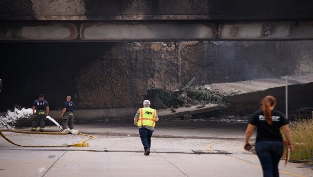 Firefighters work at a collapsed portion of Interstate 95, caused by a large vehicle fire, in Philadelphia, Pennsylvania. Runoff from the fire or perhaps broken gas lines caused explosions underground, he added. AFP Firefighters work at a collapsed portion of Interstate 95, caused by a large vehicle fire, in Philadelphia, Pennsylvania. Runoff from the fire or perhaps broken gas lines caused explosions underground, he added. AFP