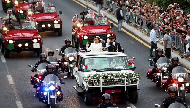 The newlyweds emerged from the palace in a white custom Range Rover escorted by several bright red Land Rovers, motorcycles and a military marching band — a nod to the traditional horse-mounted processions during the reign of the country’s founder, King Abdullah I. AP