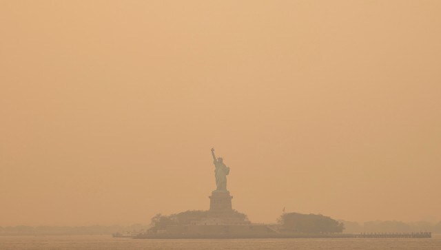The Statue of Liberty, covered in a haze-filled sky, is seen from the Staten Island Ferry. Governor Kathy Hochul said the state was making a million N95 masks — the kind prevalent at the height of the COVID-19 pandemic — available at state facilities, including 400,000 in New York City. She also urged residents to stay put. AP The Statue of Liberty, covered in a haze-filled sky, is seen from the Staten Island Ferry. Governor Kathy Hochul said the state was making a million N95 masks — the kind prevalent at the height of the COVID-19 pandemic — available at state facilities, including 400,000 in New York City. She also urged residents to stay put. AP
