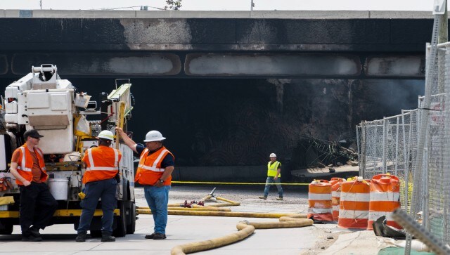 Officials work on the scene following the collapse of an elevated section of Interstate 95 after a tanker truck caught fire in Philadelphia. The northbound lanes of I-95 were gone and the southbound lanes were “compromised” by heat from the fire, said Derek Bowmer, battalion chief of the Philadelphia Fire Department. AP Officials work on the scene following the collapse of an elevated section of Interstate 95 after a tanker truck caught fire in Philadelphia. The northbound lanes of I-95 were gone and the southbound lanes were “compromised” by heat from the fire, said Derek Bowmer, battalion chief of the Philadelphia Fire Department. AP