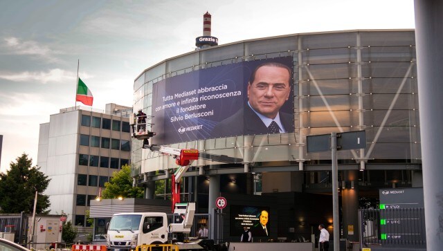Silvio Berlusconi’s legacy — positive or negative — was being hotly debated among Italians as the nation prepared for a national day of mourning and a state funeral in Milan’s Gothic-era Duomo cathedral on Wednesday. A giant tank-you poster is set up at the Mediaset media conglomerate headquarters in Cologno Monzese. AP