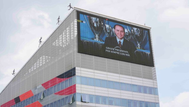 Images of Silvio Berlusconi are displayed on a giant screen at the AC Milan soccer team headquarters, in Milan. Hungarian president Viktor Orban is among the highest-ranking of the foreign dignitaries whose attendance at the funeral is confirmed. AP