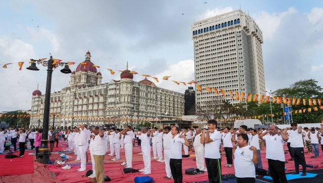 People perform yoga to celebrate the International Day of Yoga, at Gateway of India in Mumbai. The Ministry of Ayush is working with the Tribal Cooperative Marketing Development Federation of India Ltd (TRIFED) to provide 34,000 yoga mats that were uniquely made by tribal craftsmen around the nation. PTI People perform yoga to celebrate the International Day of Yoga, at Gateway of India in Mumbai. The Ministry of Ayush is working with the Tribal Cooperative Marketing Development Federation of India Ltd (TRIFED) to provide 34,000 yoga mats that were uniquely made by tribal craftsmen around the nation. PTI