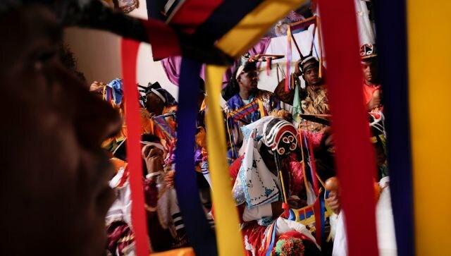 Dancing devils generally pray for health and well-being as they bow down before the Holy Sacrament after hearing mass. This act symbolises the victory of good over evil. AP