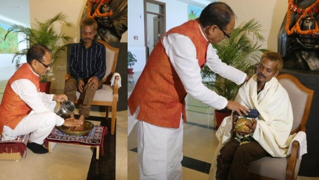 Watch: MP CM Shivraj Chouhan washes feet of tribal man urinated on, says 'people are like God to me' Watch: MP CM Shivraj Chouhan washes feet of tribal man urinated on, says 'people are like God to me'