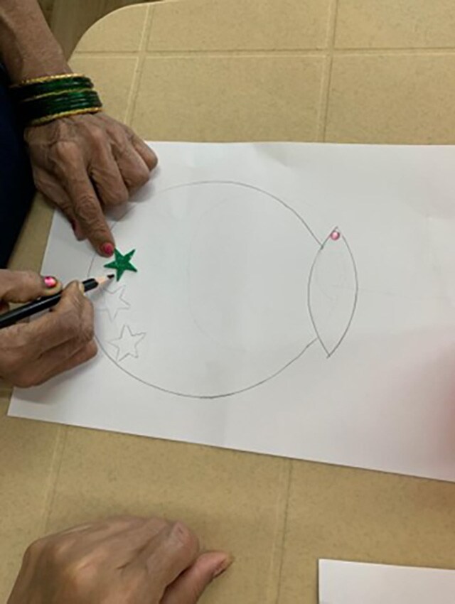 A patient engaged in drawing at the centre