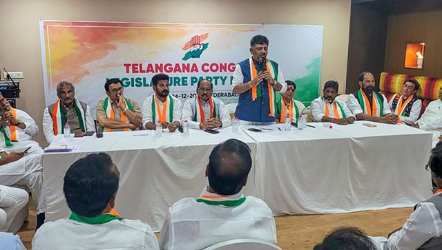 Congress leader DK Shivakumar speaks as Telangana Congress president A Revanth Reddy and party leader Manikrao Thakre look on during the Congress Legislature Party (CLP) meeting, in Hyderabad, on 4 December, 2023. PTI