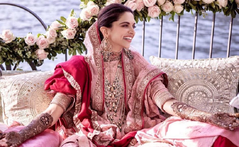 Deepika reportedly got emotional during her mehendi ceremony for which she chose an ethic, dusty pink and red number. Image via Twitter/@RanveerOfficial Deepika reportedly got emotional during her mehendi ceremony for which she chose an ethic, dusty pink and red number. Image via Twitter/@RanveerOfficial