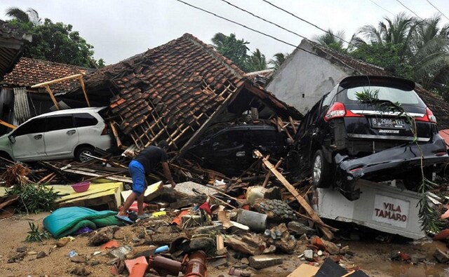 “It was so strong. The strongest I ever felt. We all ran out of buildings,” said Yanti, a 40-year-old housewife in Donggala. Reuters “It was so strong. The strongest I ever felt. We all ran out of buildings,” said Yanti, a 40-year-old housewife in Donggala. Reuters