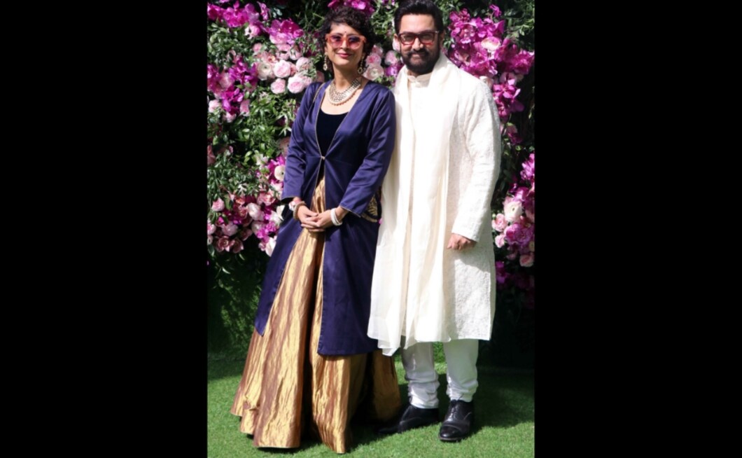 Aamir Khan complemented wife Kiran Rao's blue ensemble with a pristine white kurta. Photo: Sachin Gokhale Aamir Khan complemented wife Kiran Rao's blue ensemble with a pristine white kurta. Photo: Sachin Gokhale