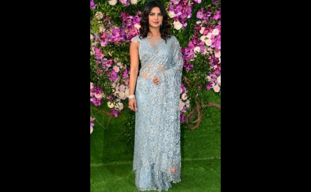 Priyanka Chopra looked ethereal in a grey saree at Akash-Shloka's wedding. Photo; Sachin Gokhale Priyanka Chopra looked ethereal in a grey saree at Akash-Shloka's wedding. Photo; Sachin Gokhale