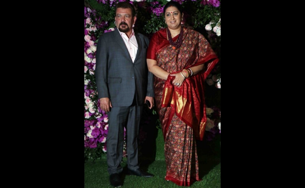 Union Cabinet Minister of Textiles Smriti Irani with husband at Akash, Shloka's wedding. Photo; Sachin Gokhale Union Cabinet Minister of Textiles Smriti Irani with husband at Akash, Shloka's wedding. Photo; Sachin Gokhale