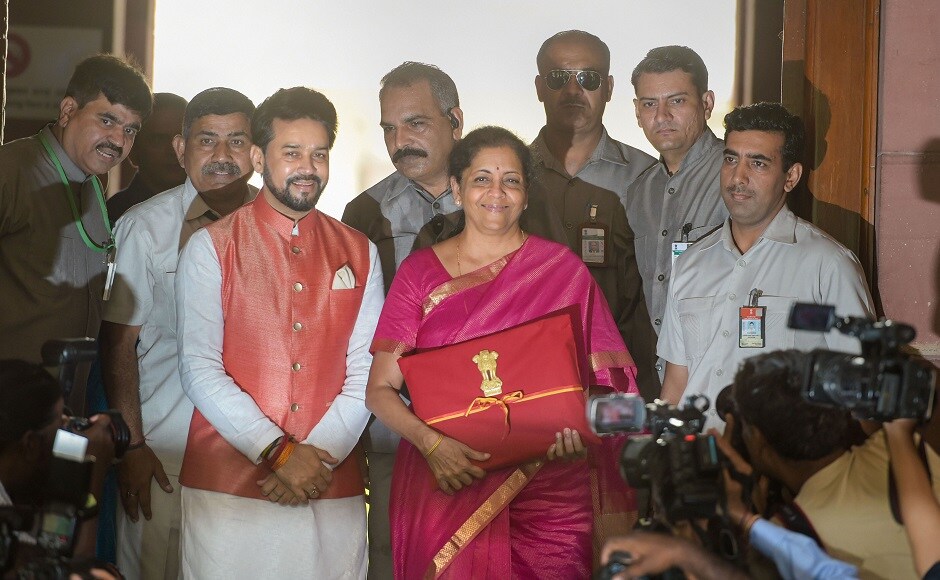 Doing away with the traditional brown budget briefcase, Sitharaman went for a red coloured bag, with the national emblem emblazoned on top of it. Nirmala Sitharaman proposed to merge the NRI portfolio scheme route with foreign portfolio investment route. PTI Doing away with the traditional brown budget briefcase, Sitharaman went for a red coloured bag, with the national emblem emblazoned on top of it. Nirmala Sitharaman proposed to merge the NRI portfolio scheme route with foreign portfolio investment route. PTI