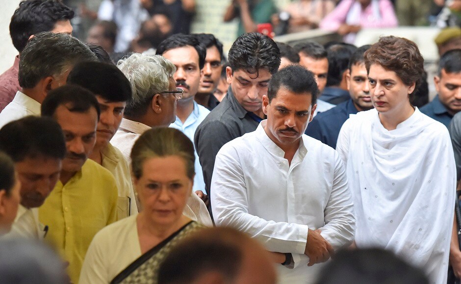 Family members, colleagues, Congress workers, and admirers braved heavy rains and gusty winds to bid her a final farewell at the national capital's oldest cremation ground, Nigambodh Ghat. PTI Family members, colleagues, Congress workers, and admirers braved heavy rains and gusty winds to bid her a final farewell at the national capital's oldest cremation ground, Nigambodh Ghat. PTI