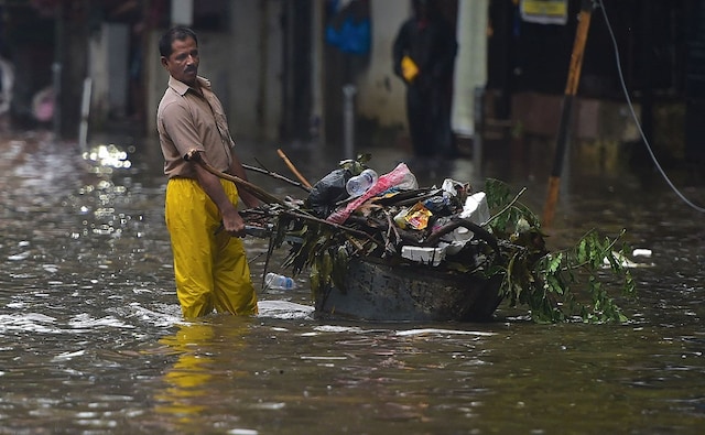 After a week-long dry spell, heavy rains lashed Mumbai and neighbouring districts during the night and on Wednesday morning, causing flooding in some areas and slowing down local trains and road traffic movement. PTI After a week-long dry spell, heavy rains lashed Mumbai and neighbouring districts during the night and on Wednesday morning, causing flooding in some areas and slowing down local trains and road traffic movement. PTI
