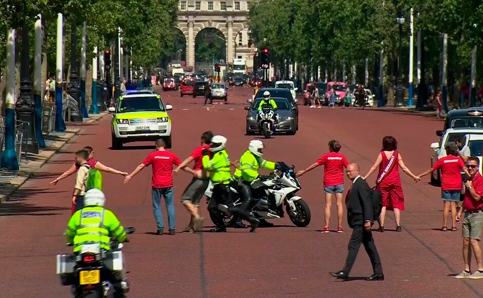 In some drama on his way to the palace, Johnson's cavalcade was blocked by Greenpeace protestors wanting to hand over a climate change petition to the new Prime Minister. The group that formed a human chain blockage were quickly moved out of the way by security officials. AP In some drama on his way to the palace, Johnson's cavalcade was blocked by Greenpeace protestors wanting to hand over a climate change petition to the new Prime Minister. The group that formed a human chain blockage were quickly moved out of the way by security officials. AP