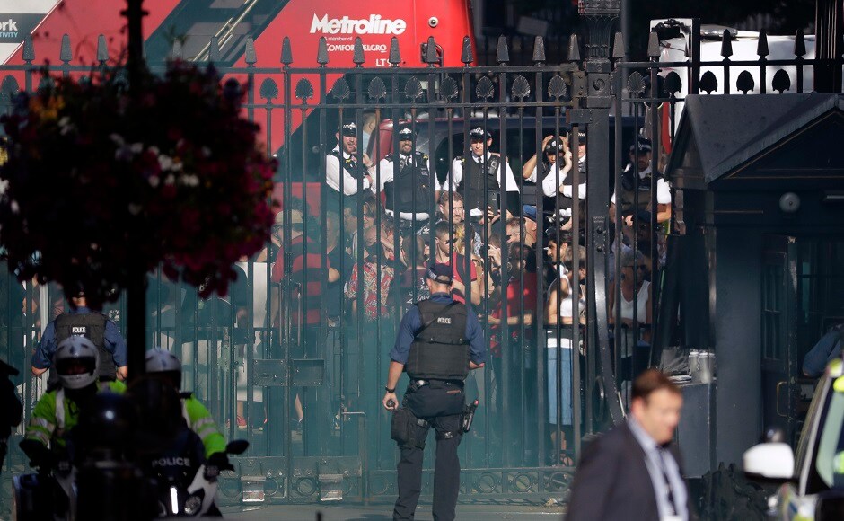 Protesters let off smoke bombs at the gates outside 10 Downing Street. Johnson became the 14th prime minister to be appointed by Queen Elizabeth II, and the 55th to hold the post. AP Protesters let off smoke bombs at the gates outside 10 Downing Street. Johnson became the 14th prime minister to be appointed by Queen Elizabeth II, and the 55th to hold the post. AP
