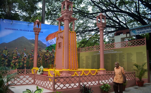 The Indian Army responded to the intrusion by the Pakistani Army with 'Operation Vijay', fighting battles on rugged terrains and difficult peaks. In this image, a visitor at the Kargil War Memorial replica can be seen created by the Film and Television Institute of India (FTII), Pune. PTI The Indian Army responded to the intrusion by the Pakistani Army with 'Operation Vijay', fighting battles on rugged terrains and difficult peaks. In this image, a visitor at the Kargil War Memorial replica can be seen created by the Film and Television Institute of India (FTII), Pune. PTI
