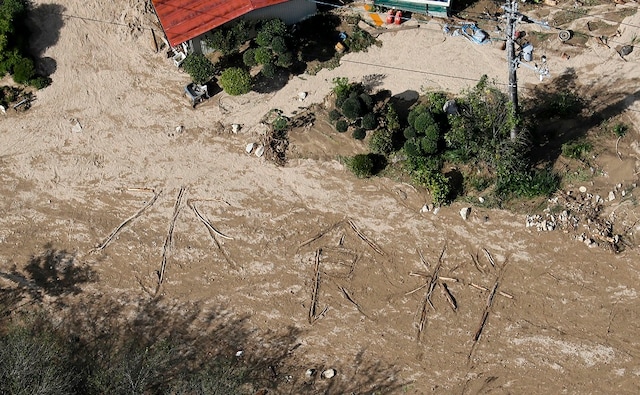 Hagibis crashed into the country on Saturday night, but brought hours of heavy rains even before it arrived, causing landslides and filling rivers until they burst their banks. In this image, the words 'Water, Food,' are written on the ground in Marumori town, Miyagi prefecture. AP Hagibis crashed into the country on Saturday night, but brought hours of heavy rains even before it arrived, causing landslides and filling rivers until they burst their banks. In this image, the words 'Water, Food,' are written on the ground in Marumori town, Miyagi prefecture. AP