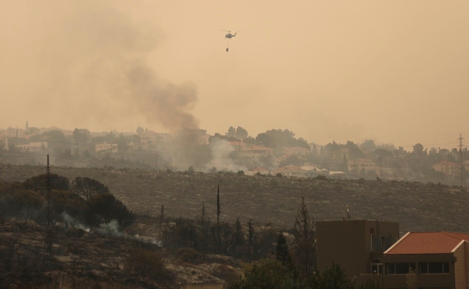 Wildfires spread through parts of Lebanon on Tuesday after forcing some residents to flee their homes in the middle of the night, while others were stuck inside as the flames reached villages south of Beirut, authorities said. AP Wildfires spread through parts of Lebanon on Tuesday after forcing some residents to flee their homes in the middle of the night, while others were stuck inside as the flames reached villages south of Beirut, authorities said. AP