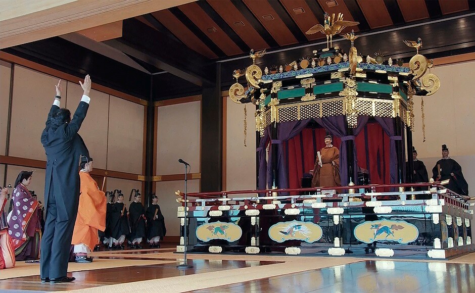 Prime Minister Shinzo Abe congratulated him and led the cheers of 'Banzai,' which traditionally means '10,000 years.' AP Prime Minister Shinzo Abe congratulated him and led the cheers of 'Banzai,' which traditionally means '10,000 years.' AP