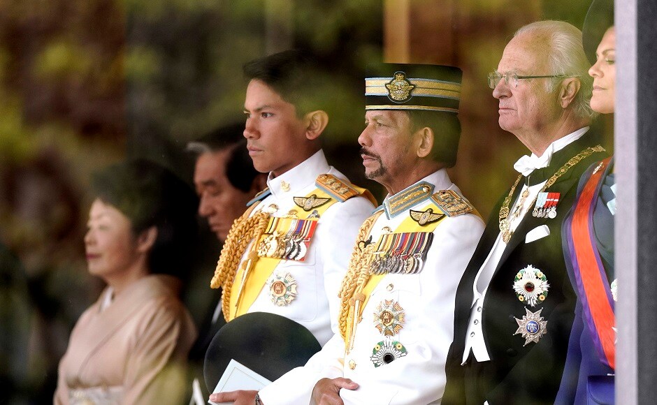 Swedish King Carl XVI Gustaf, right, was seen attending the enthronement ceremony of Naruhito, with Brunei's Sultan Hassanal Bolkiah, centre right, at the Imperial Palace, Japan. AP Swedish King Carl XVI Gustaf, right, was seen attending the enthronement ceremony of Naruhito, with Brunei's Sultan Hassanal Bolkiah, centre right, at the Imperial Palace, Japan. AP