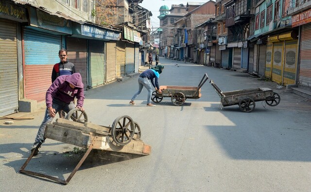 People put up blockades in at least five different places in Srinagar, including downtown Srinagar and 90 Feet Road. Shops and business establishments were closed and vehicles were off the roads due to the clashes. PTI People put up blockades in at least five different places in Srinagar, including downtown Srinagar and 90 Feet Road. Shops and business establishments were closed and vehicles were off the roads due to the clashes. PTI