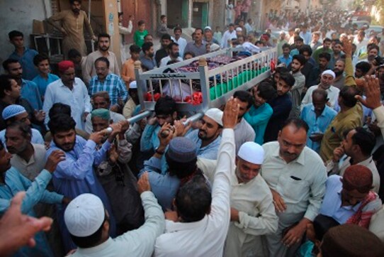 Pakistan train fire: Officials to use DNA tests to identify victims; funeral processions begin in Mirpurkhas Pakistan train fire: Officials to use DNA tests to identify victims; funeral processions begin in Mirpurkhas