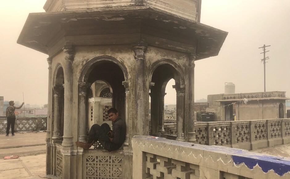 There seems to be a lack of awareness about the air pollution and ways to protect oneself against it. Here, a teenage boy sits outdoors, unaffected by the air quality. There seems to be a lack of awareness about the air pollution and ways to protect oneself against it. Here, a teenage boy sits outdoors, unaffected by the air quality.