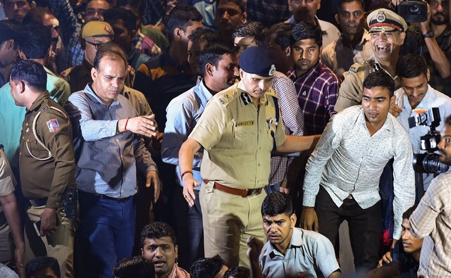 Addressing the protesters, Special Commissioner of Police (Crime) Satish Golcha urged them to end their stir and resume duty, while assuring them that a review petition will be filed against the Delhi High Court order in connection with the clashes. Delhi Police has a strength of over 80,000 personnel. PTI Addressing the protesters, Special Commissioner of Police (Crime) Satish Golcha urged them to end their stir and resume duty, while assuring them that a review petition will be filed against the Delhi High Court order in connection with the clashes. Delhi Police has a strength of over 80,000 personnel. PTI